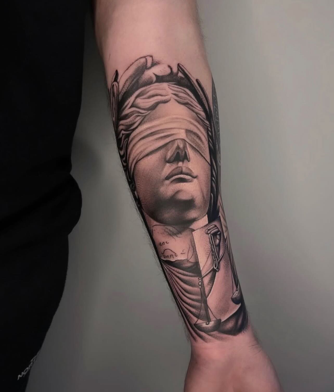 Blindfolded Lady Justice statue realism